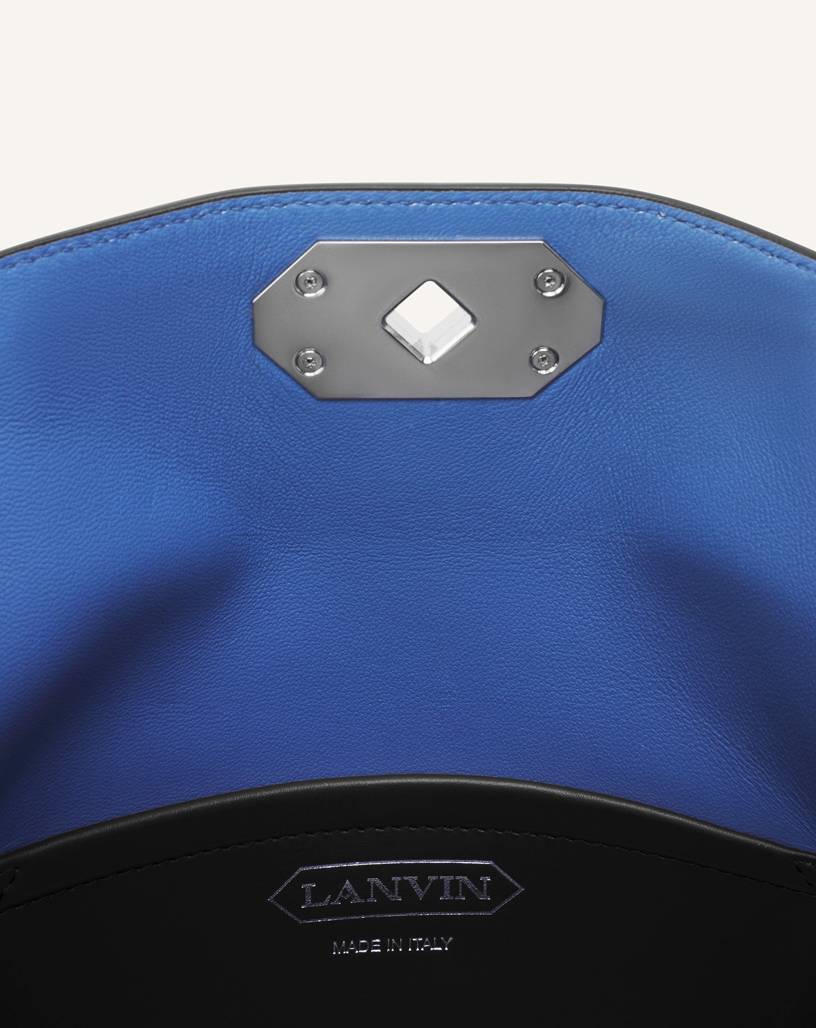 SAC POCHETTE COMPAGNON ASYMÉTRIQUE EN CUIR