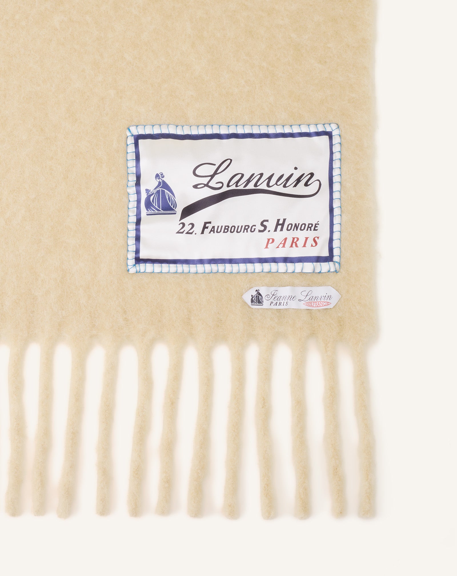 ÉCHARPE À FRANGES ÉTIQUETTE 22 FAUBOURG EN LAINE BLANC
