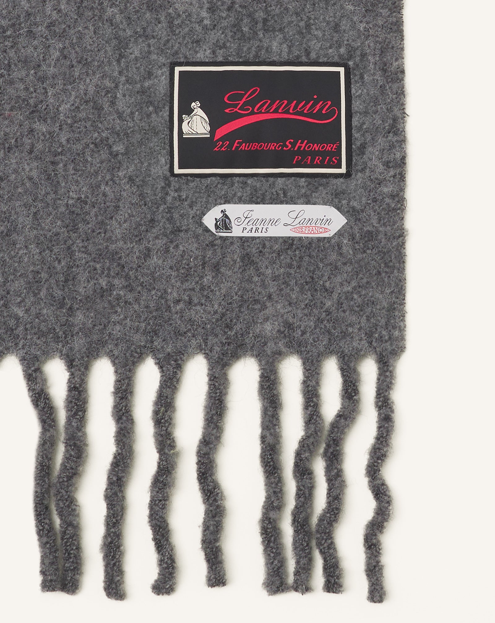 ÉCHARPE À FRANGES ÉTIQUETTE 22 FAUBOURG EN LAINE NOIR