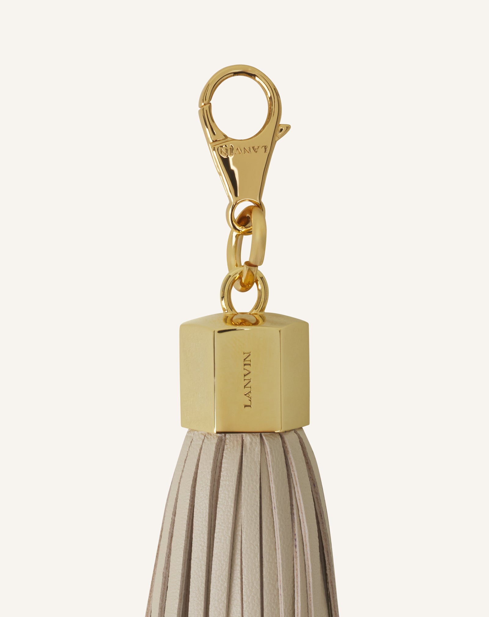ACCESSOIRE DE SAC POMPON EN CUIR
