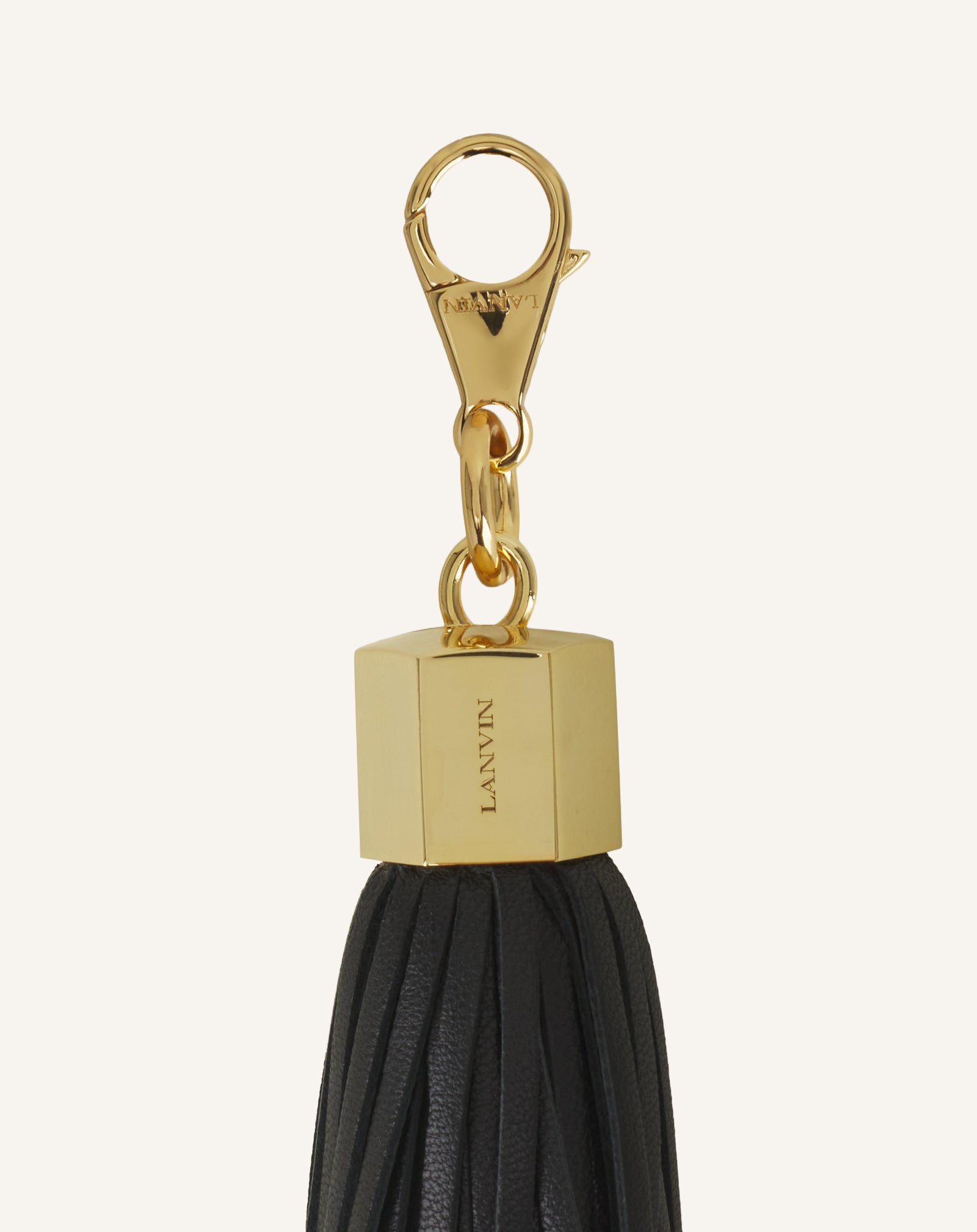 ACCESSOIRE DE SAC POMPON EN CUIR