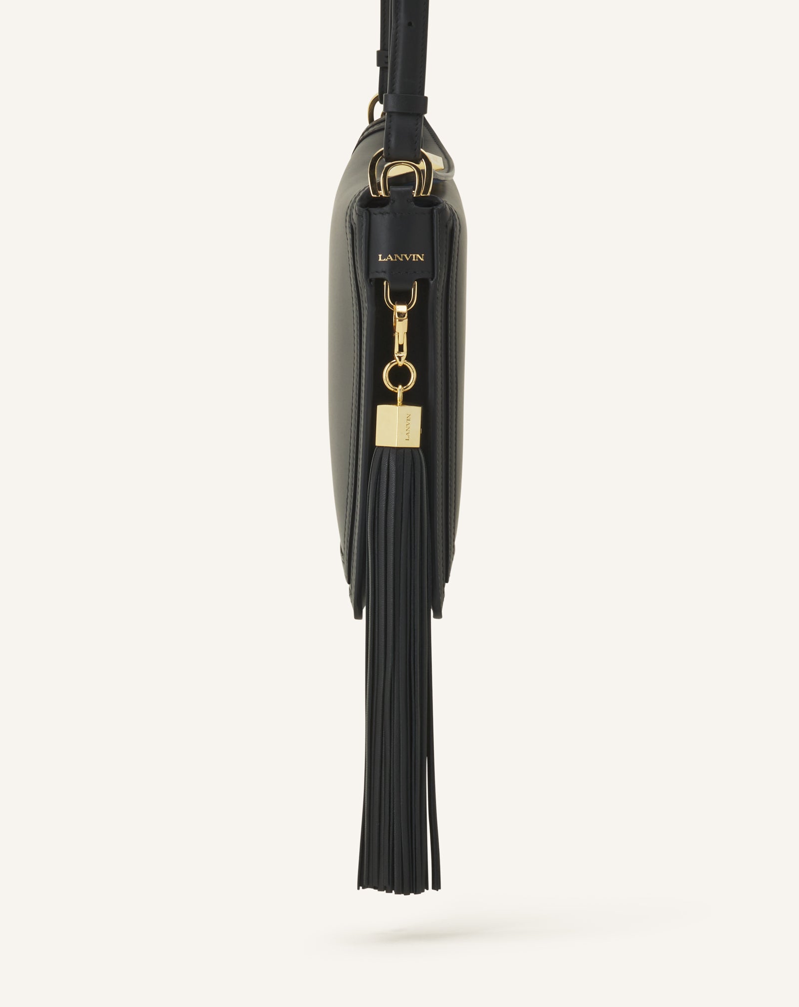 ACCESSOIRE DE SAC POMPON EN CUIR NOIR