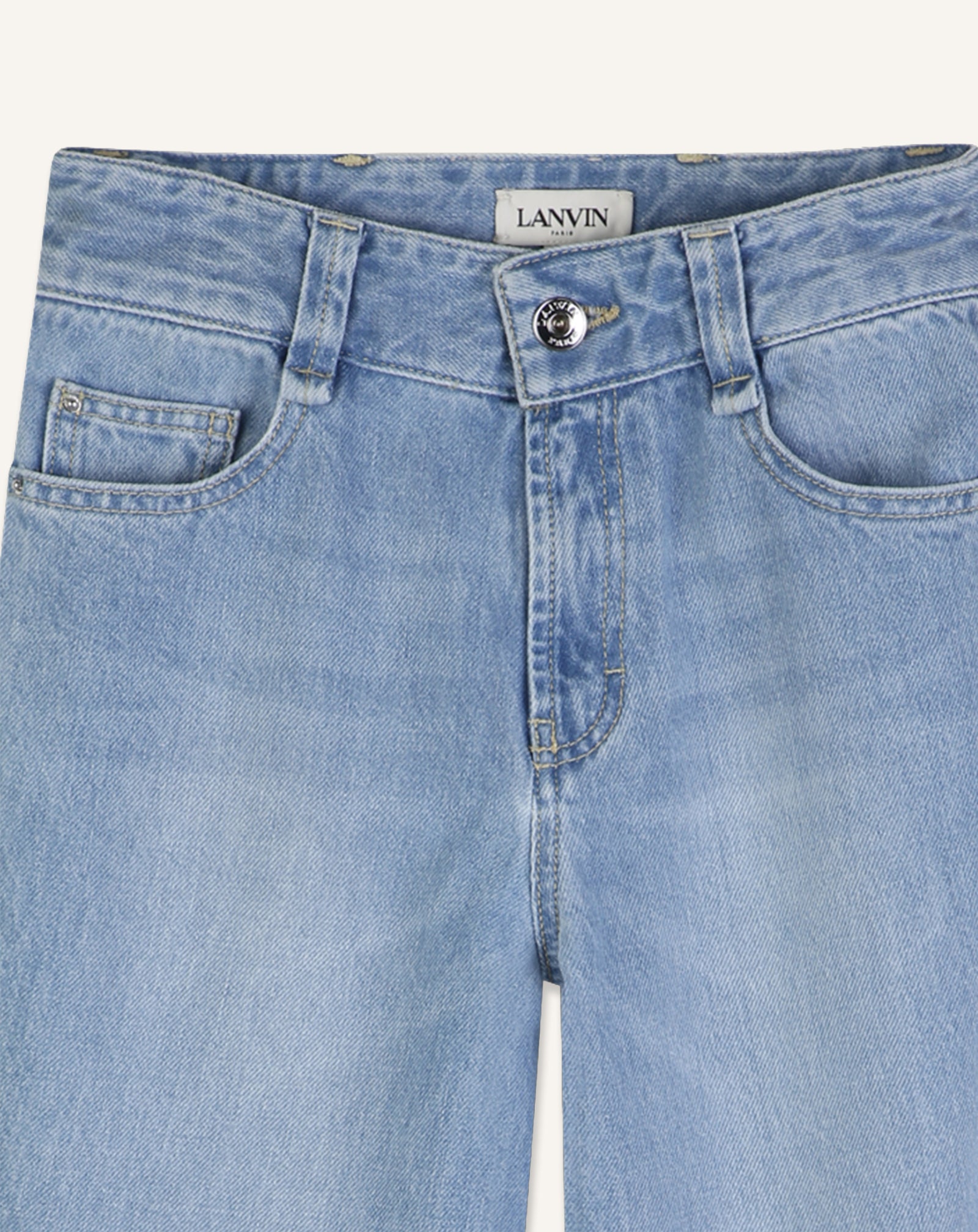 PANTALON TWISTÉ EN DENIM BLEU